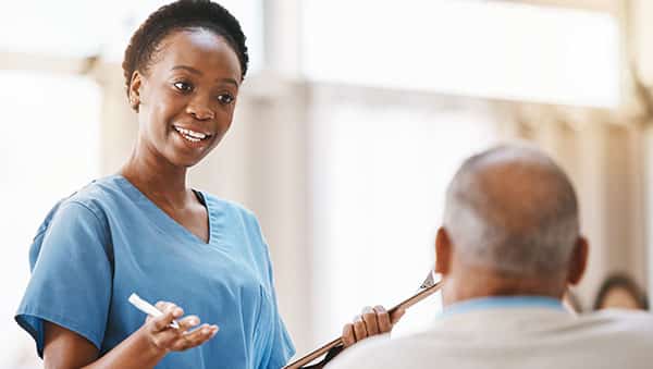Consulting, medical and checklist with old man and nurse for urocuff therapy. 